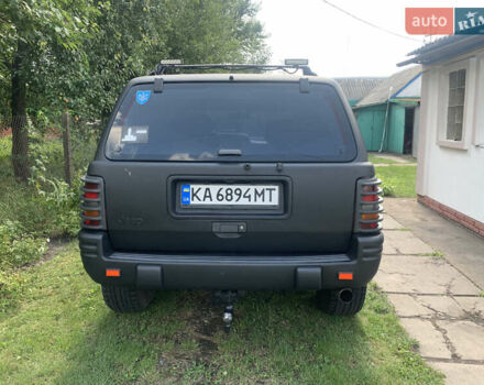 Черный Джип Гранд Чероки, объемом двигателя 4 л и пробегом 399 тыс. км за 6500 $, фото 4 на Automoto.ua