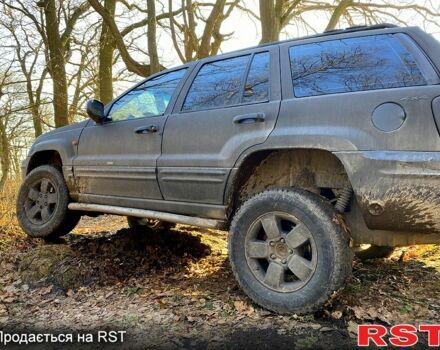 Чорний Джип Grand Cherokee, об'ємом двигуна 4.7 л та пробігом 200 тис. км за 7500 $, фото 2 на Automoto.ua