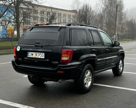 Черный Джип Гранд Чероки, объемом двигателя 3.1 л и пробегом 430 тыс. км за 3500 $, фото 3 на Automoto.ua