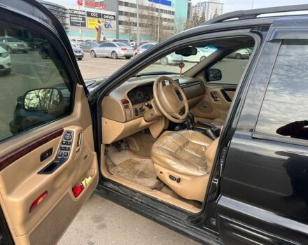 Чорний Джип Grand Cherokee, об'ємом двигуна 4 л та пробігом 335 тис. км за 5250 $, фото 2 на Automoto.ua