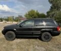 Чорний Джип Grand Cherokee, об'ємом двигуна 3.1 л та пробігом 350 тис. км за 5400 $, фото 2 на Automoto.ua