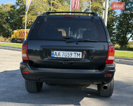 Чорний Джип Grand Cherokee, об'ємом двигуна 4.7 л та пробігом 349 тис. км за 12000 $, фото 6 на Automoto.ua