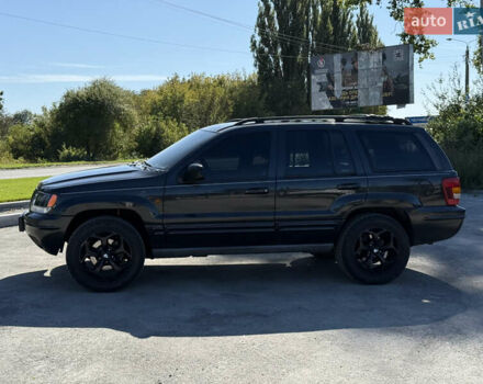Чорний Джип Grand Cherokee, об'ємом двигуна 4.7 л та пробігом 349 тис. км за 12000 $, фото 1 на Automoto.ua