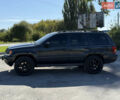 Чорний Джип Grand Cherokee, об'ємом двигуна 4.7 л та пробігом 349 тис. км за 12000 $, фото 1 на Automoto.ua