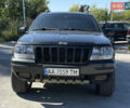 Чорний Джип Grand Cherokee, об'ємом двигуна 4.7 л та пробігом 349 тис. км за 12000 $, фото 2 на Automoto.ua