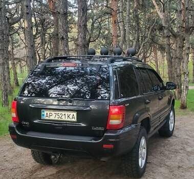 Чорний Джип Grand Cherokee, об'ємом двигуна 3.12 л та пробігом 240 тис. км за 8700 $, фото 24 на Automoto.ua