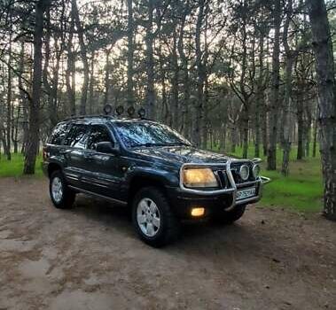 Чорний Джип Grand Cherokee, об'ємом двигуна 3.12 л та пробігом 240 тис. км за 8700 $, фото 11 на Automoto.ua