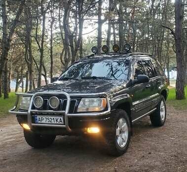 Чорний Джип Grand Cherokee, об'ємом двигуна 3.12 л та пробігом 240 тис. км за 8700 $, фото 19 на Automoto.ua