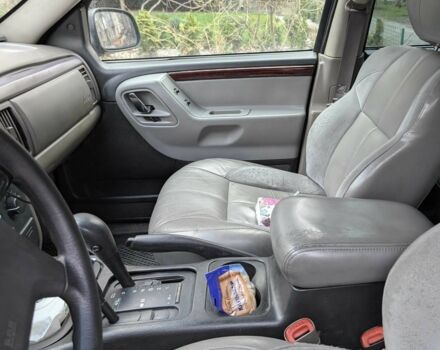 Чорний Джип Grand Cherokee, об'ємом двигуна 4.7 л та пробігом 240 тис. км за 9000 $, фото 5 на Automoto.ua