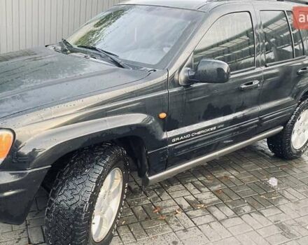 Джип Гранд Чероки 2002 в Днепре (Днепропетровске) на Automoto.ua Черный Джип Гранд Чероки, объемом двигателя 2.69 л и пробегом 400 тыс. км за 6000 $, фото 5 на Automoto.ua