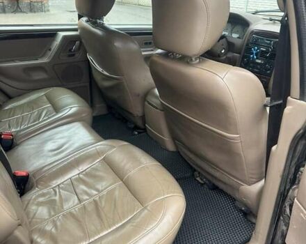 Чорний Джип Grand Cherokee, об'ємом двигуна 2.69 л та пробігом 409 тис. км за 6750 $, фото 4 на Automoto.ua