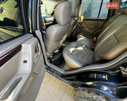 Чорний Джип Grand Cherokee, об'ємом двигуна 2.69 л та пробігом 395 тис. км за 9000 $, фото 10 на Automoto.ua