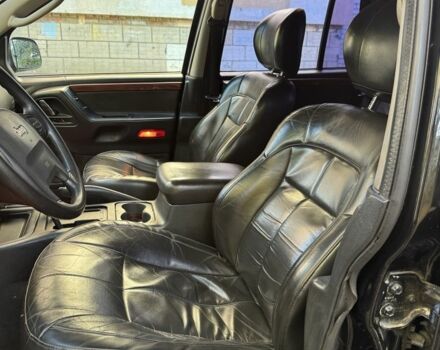 Джип Grand Cherokee 2002 у Києві на Automoto.ua Чорний Джип Grand Cherokee, об'ємом двигуна 0 л та пробігом 200 тис. км за 2599 $, фото 5 на Automoto.ua