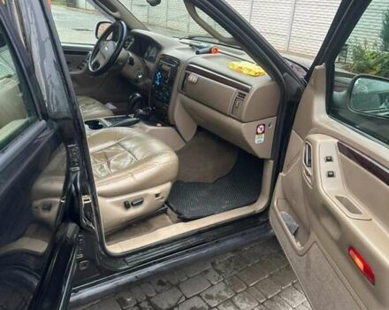 Чорний Джип Grand Cherokee, об'ємом двигуна 2.69 л та пробігом 409 тис. км за 6750 $, фото 3 на Automoto.ua