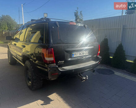 Чорний Джип Grand Cherokee, об'ємом двигуна 2.69 л та пробігом 395 тис. км за 9000 $, фото 4 на Automoto.ua