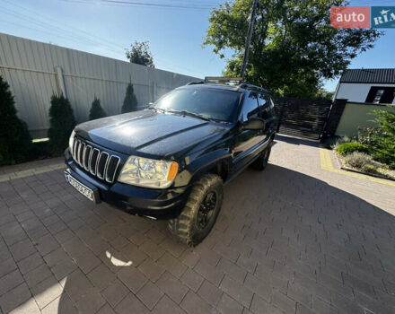 Чорний Джип Grand Cherokee, об'ємом двигуна 2.69 л та пробігом 395 тис. км за 9000 $, фото 1 на Automoto.ua