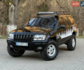 Чорний Джип Grand Cherokee, об'ємом двигуна 4 л та пробігом 320 тис. км за 8700 $, фото 1 на Automoto.ua