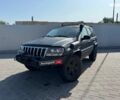 Чорний Джип Grand Cherokee, об'ємом двигуна 4.7 л та пробігом 220 тис. км за 9690 $, фото 1 на Automoto.ua