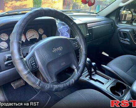 Джип Гранд Чероки 2002 в Днепре (Днепропетровске) на Automoto.ua Черный Джип Гранд Чероки, объемом двигателя 2.7 л и пробегом 300 тыс. км за 5000 $, фото 4 на Automoto.ua