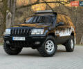 Чорний Джип Grand Cherokee, об'ємом двигуна 4 л та пробігом 320 тис. км за 8700 $, фото 48 на Automoto.ua