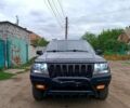 Черный Джип Гранд Чероки, объемом двигателя 2.7 л и пробегом 346 тыс. км за 2500 $, фото 3 на Automoto.ua
