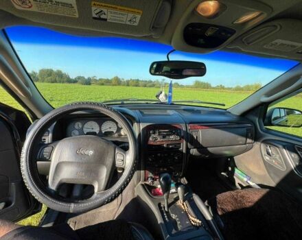 Черный Джип Гранд Чероки, объемом двигателя 0 л и пробегом 300 тыс. км за 7400 $, фото 4 на Automoto.ua