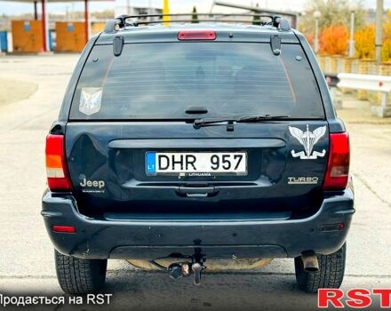Джип Гранд Чероки 2003 в Новомосковске на Automoto.ua Черный Джип Гранд Чероки, объемом двигателя 3 л и пробегом 204 тыс. км за 3670 $, фото 4 на Automoto.ua