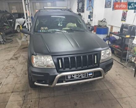 Чорний Джип Grand Cherokee, об'ємом двигуна 4 л та пробігом 294 тис. км за 5000 $, фото 3 на Automoto.ua