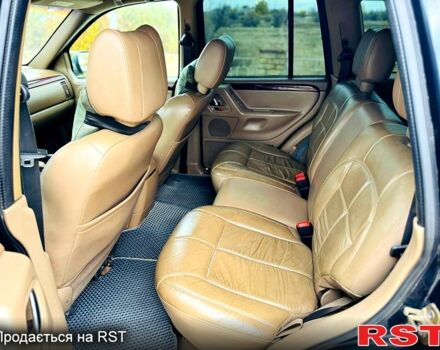 Джип Гранд Чероки 2003 в Новомосковске на Automoto.ua Черный Джип Гранд Чероки, объемом двигателя 3 л и пробегом 204 тыс. км за 3670 $, фото 8 на Automoto.ua