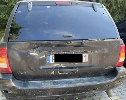 Джип Гранд Чероки 2003 в Новоукраинке на Automoto.ua Черный Джип Гранд Чероки, объемом двигателя 2.69 л и пробегом 280 тыс. км за 4100 $, фото 2 на Automoto.ua