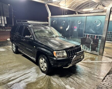 Черный Джип Гранд Чероки, объемом двигателя 2.7 л и пробегом 362 тыс. км за 4200 $, фото 1 на Automoto.ua