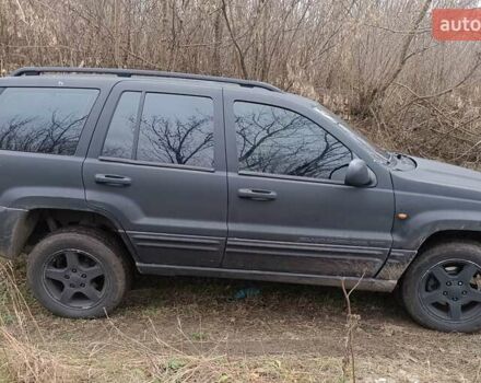 Черный Джип Гранд Чероки, объемом двигателя 2.69 л и пробегом 380 тыс. км за 4700 $, фото 1 на Automoto.ua