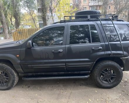 Черный Джип Гранд Чероки, объемом двигателя 2.7 л и пробегом 283 тыс. км за 6000 $, фото 1 на Automoto.ua