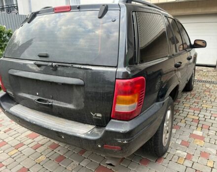 Чорний Джип Grand Cherokee, об'ємом двигуна 0 л та пробігом 142 тис. км за 4300 $, фото 1 на Automoto.ua