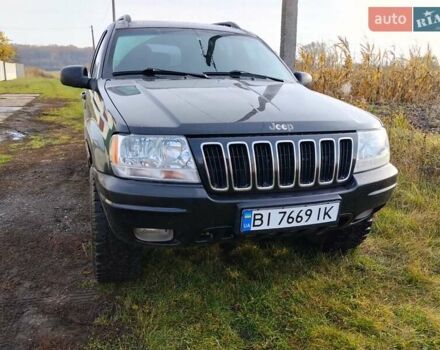 Черный Джип Гранд Чероки, объемом двигателя 2.69 л и пробегом 240 тыс. км за 9000 $, фото 1 на Automoto.ua
