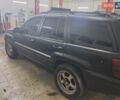 Чорний Джип Grand Cherokee, об'ємом двигуна 4 л та пробігом 294 тис. км за 5000 $, фото 4 на Automoto.ua