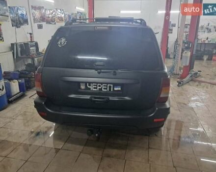 Чорний Джип Grand Cherokee, об'ємом двигуна 4 л та пробігом 294 тис. км за 5000 $, фото 2 на Automoto.ua