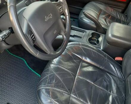 Черный Джип Гранд Чероки, объемом двигателя 2.69 л и пробегом 240 тыс. км за 9000 $, фото 7 на Automoto.ua