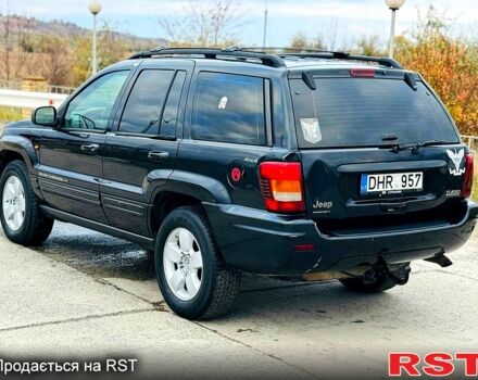 Джип Гранд Чероки 2003 в Новомосковске на Automoto.ua Черный Джип Гранд Чероки, объемом двигателя 3 л и пробегом 204 тыс. км за 3670 $, фото 2 на Automoto.ua