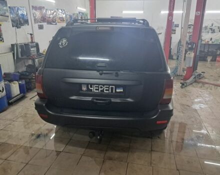 Черный Джип Гранд Чероки, объемом двигателя 4 л и пробегом 217 тыс. км за 4500 $, фото 3 на Automoto.ua