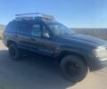 Чорний Джип Grand Cherokee, об'ємом двигуна 3.1 л та пробігом 300 тис. км за 4100 $, фото 1 на Automoto.ua