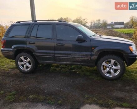 Черный Джип Гранд Чероки, объемом двигателя 2.69 л и пробегом 240 тыс. км за 9000 $, фото 2 на Automoto.ua