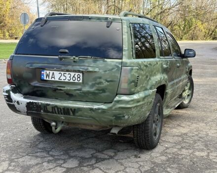Джип Гранд Чероки 2004 в Изюме на Automoto.ua Черный Джип Гранд Чероки, объемом двигателя 2.7 л и пробегом 344 тыс. км за 4300 $, фото 3 на Automoto.ua