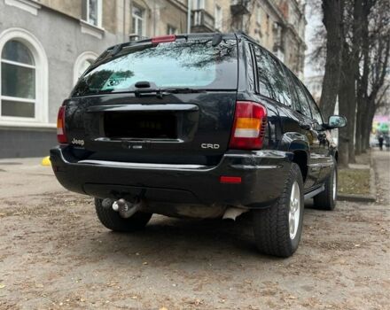 Черный Джип Гранд Чероки, объемом двигателя 2.7 л и пробегом 156 тыс. км за 6000 $, фото 1 на Automoto.ua