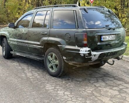 Джип Гранд Чероки 2004 в Изюме на Automoto.ua Черный Джип Гранд Чероки, объемом двигателя 2.7 л и пробегом 344 тыс. км за 4300 $, фото 4 на Automoto.ua