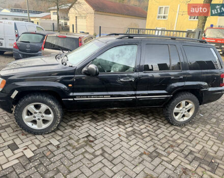 Черный Джип Гранд Чероки, объемом двигателя 2.7 л и пробегом 221 тыс. км за 3142 $, фото 2 на Automoto.ua