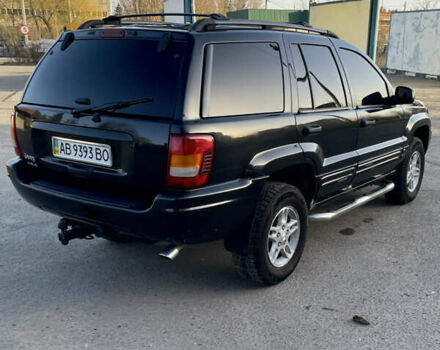 Чорний Джип Grand Cherokee, об'ємом двигуна 4 л та пробігом 120 тис. км за 5900 $, фото 1 на Automoto.ua