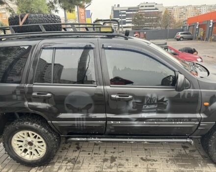 Черный Джип Гранд Чероки, объемом двигателя 2.7 л и пробегом 370 тыс. км за 6000 $, фото 2 на Automoto.ua