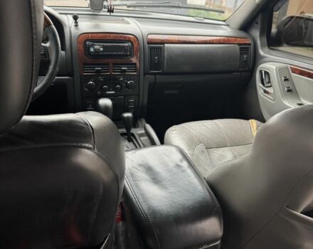 Черный Джип Гранд Чероки, объемом двигателя 2.7 л и пробегом 370 тыс. км за 6000 $, фото 8 на Automoto.ua