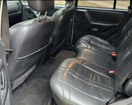 Черный Джип Гранд Чероки, объемом двигателя 0 л и пробегом 243 тыс. км за 4594 $, фото 5 на Automoto.ua